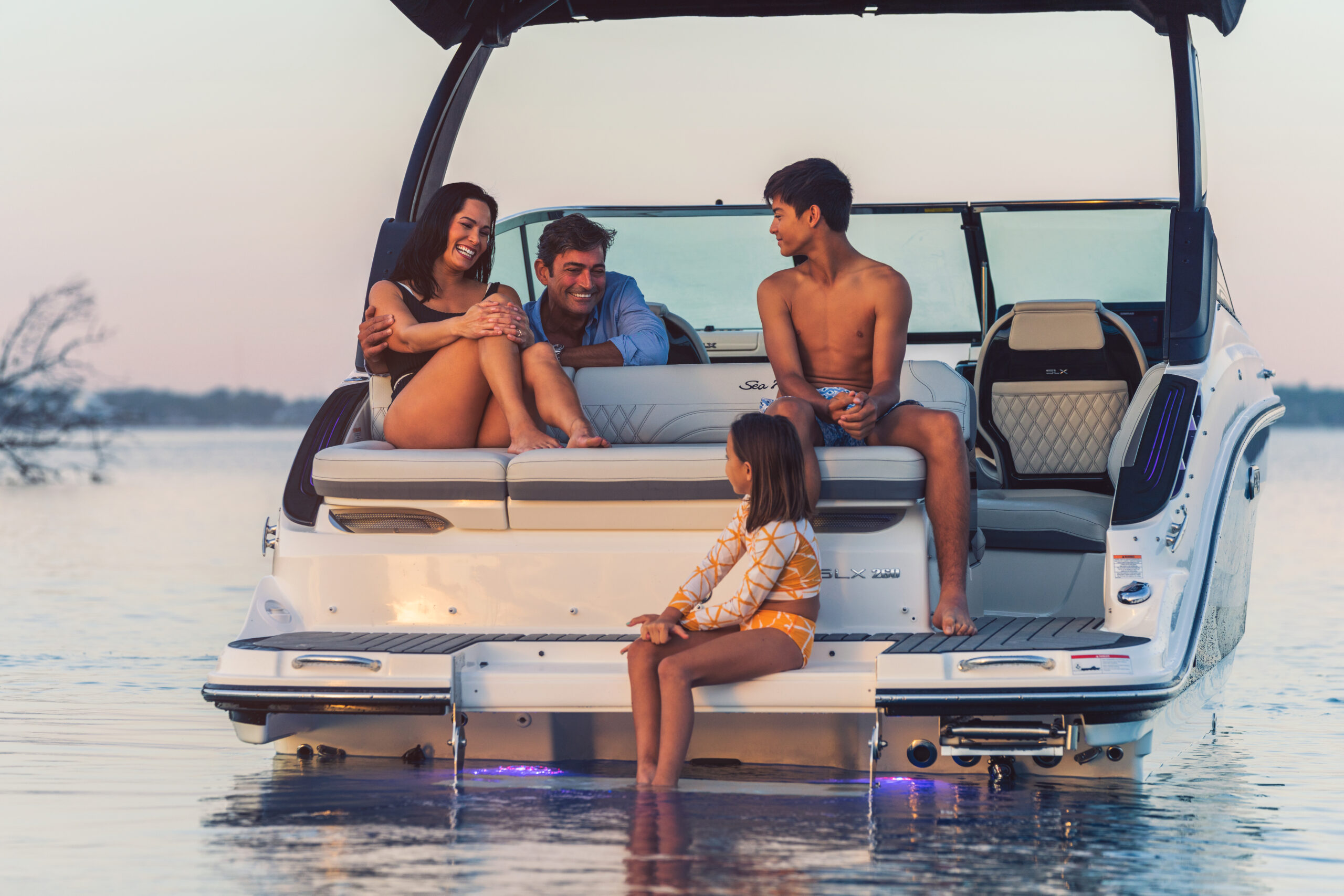 Family aboard an SLX 260