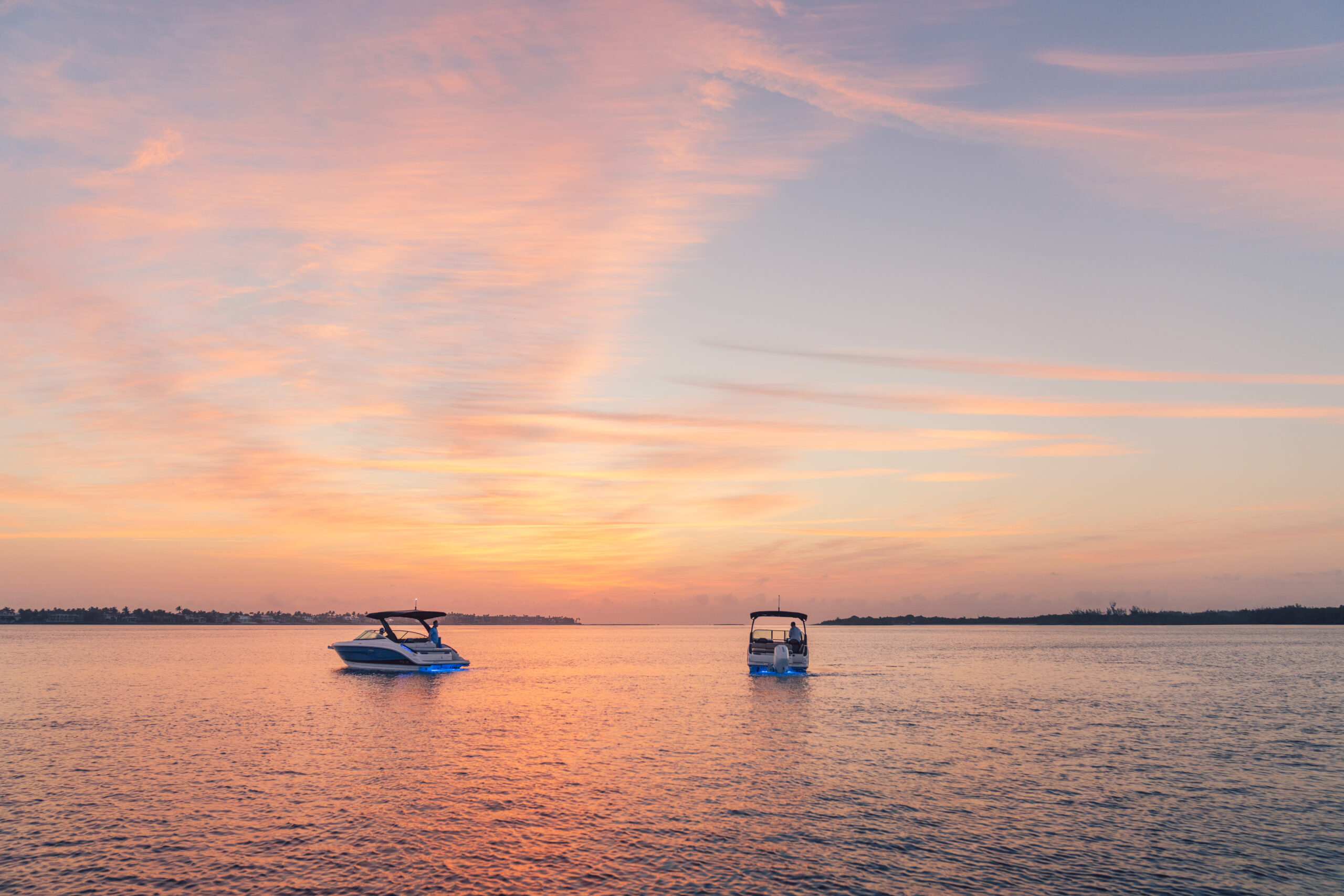 SLX 260 and SLX 260 Outboard at twilight