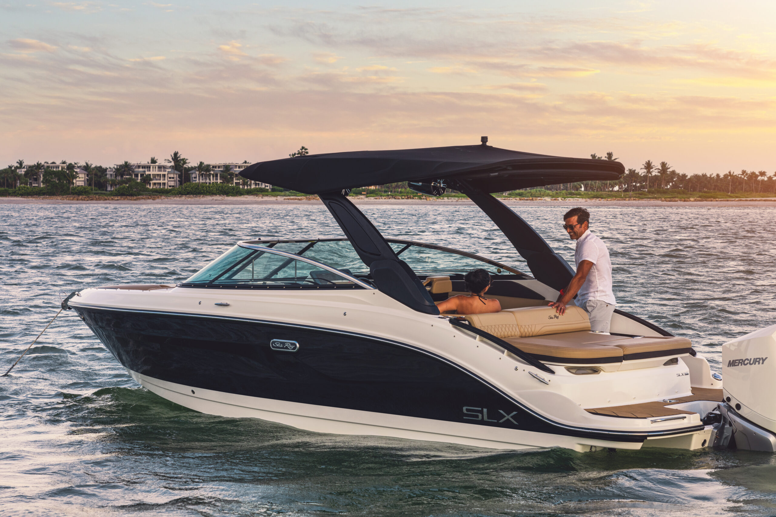 Couple aboard an SLX 260 Outboard